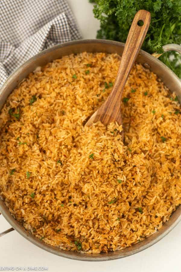 Texas Roadhouse Seasoned Rice in a skillet.