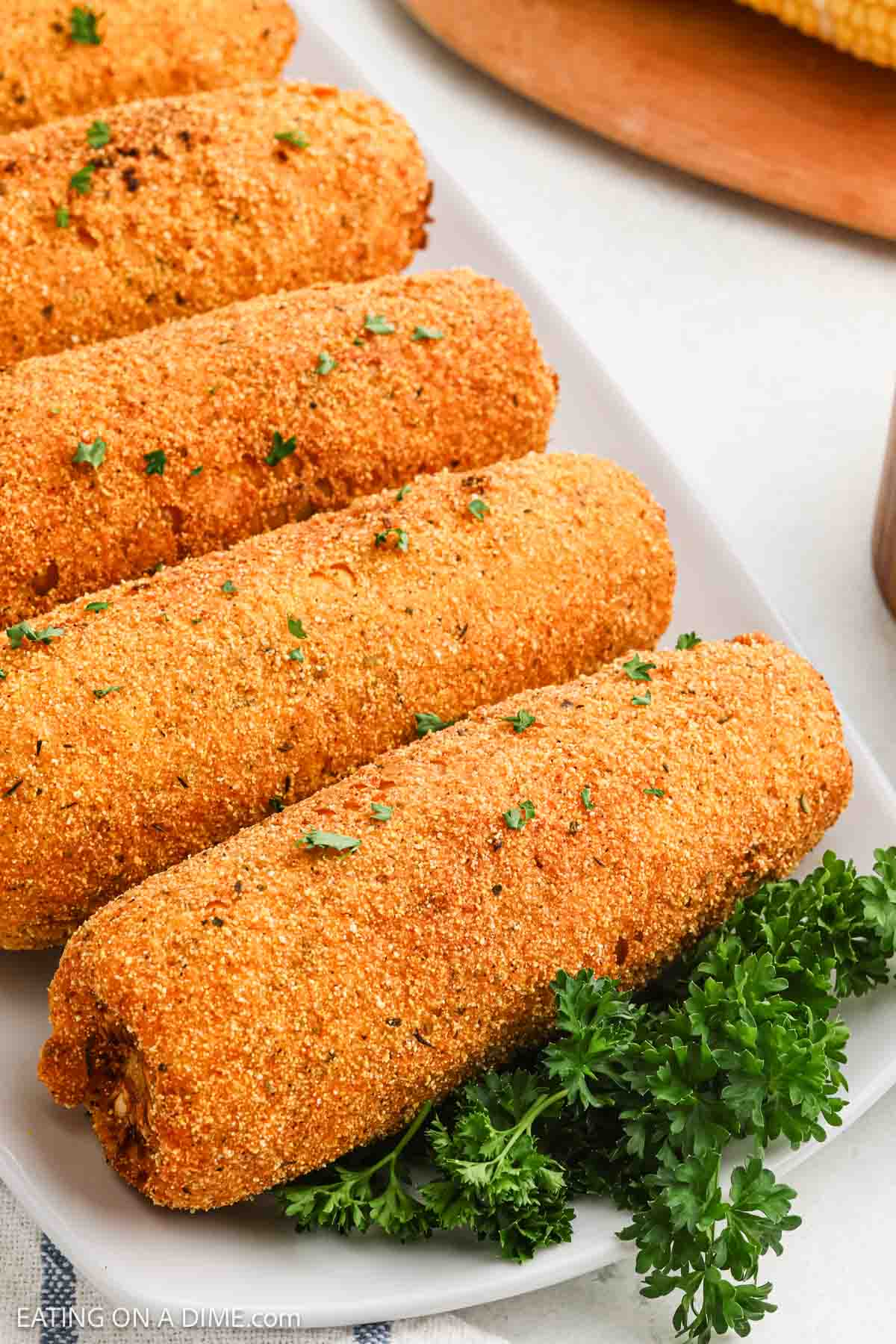 Fried Corn on the Cob on a platter
