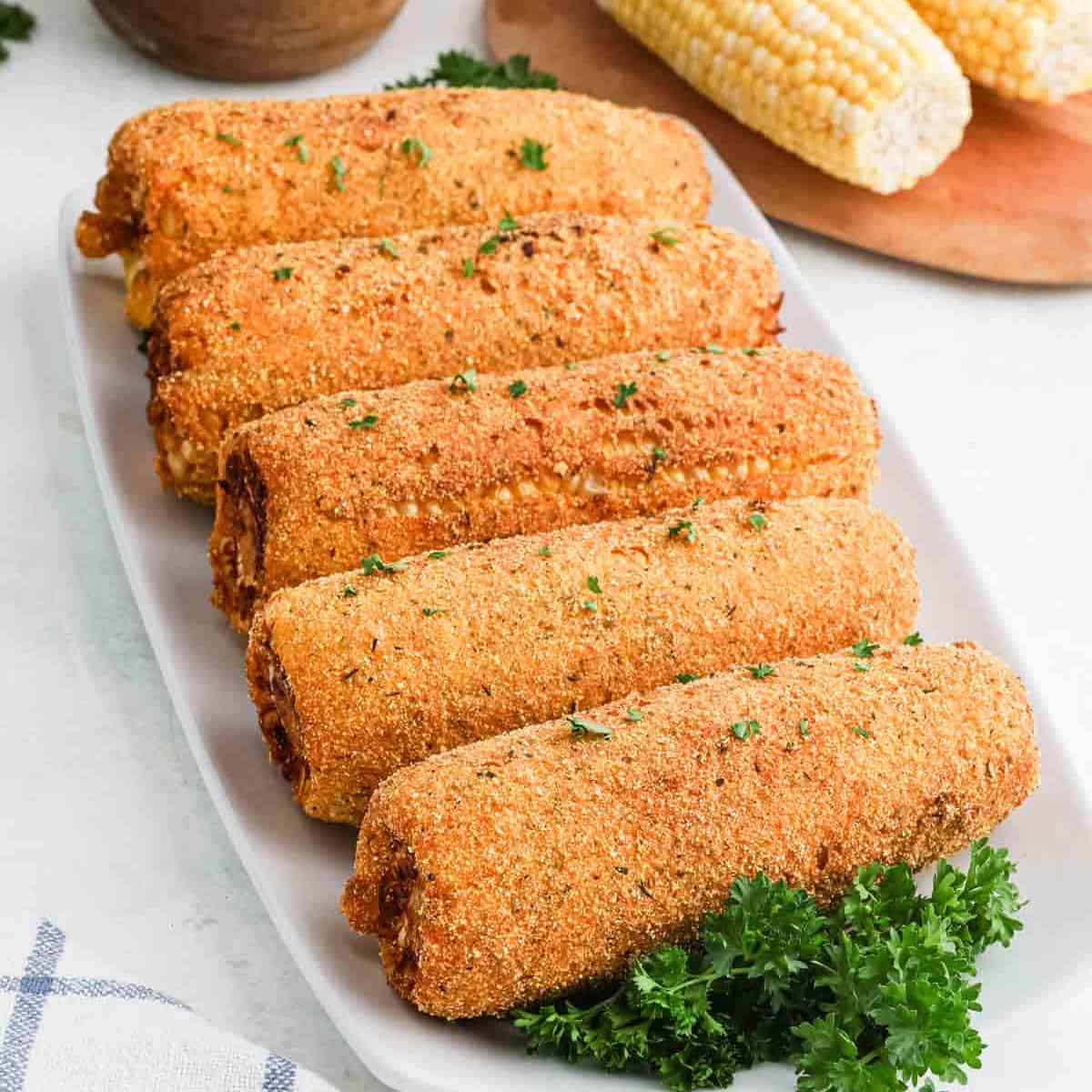 Fried Corn on the Cob on a platter