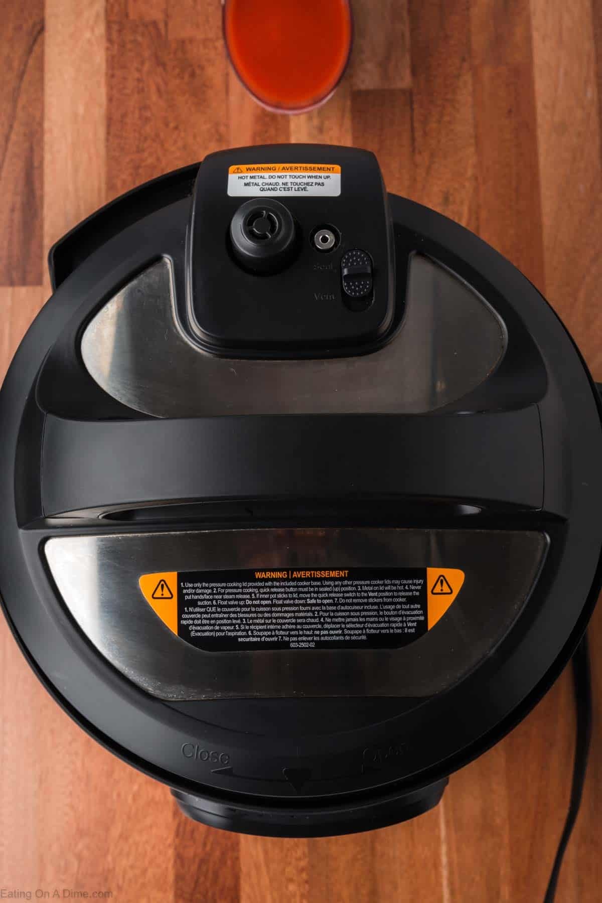 Instant pot with the lid on top