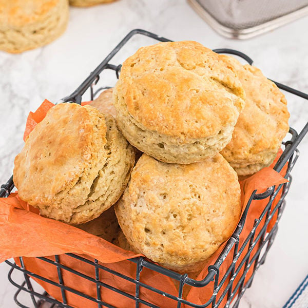 Popeyes Biscuits in a basket.