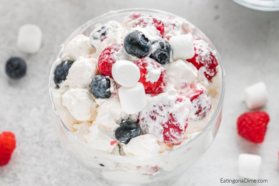 A bowl of Red White and Blue Cheesecake Salad. 