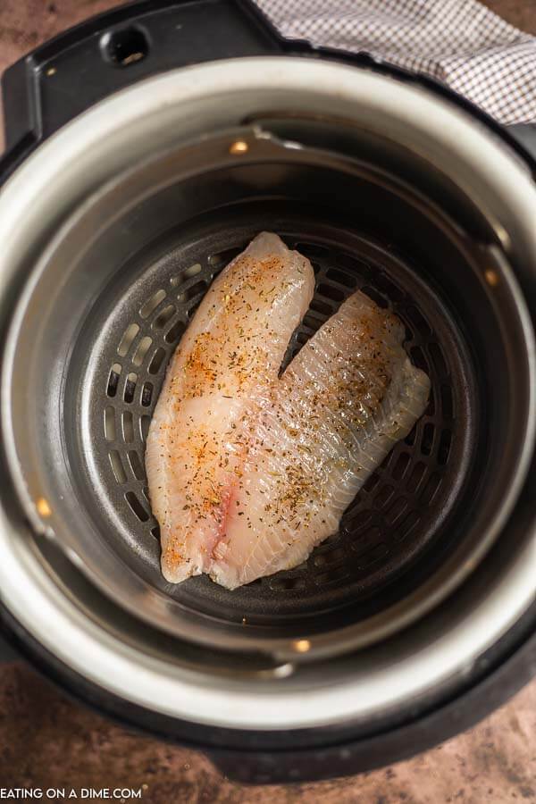 Tilapia in air fryer ready to cook. 
