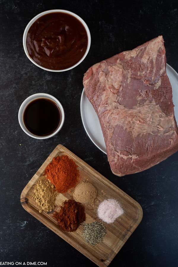 Ingredients needed - beef brisket, brown sugar, paprika, salt and pepper, worcestershire sauce, chili powder, cumin, bbq sauce, buns