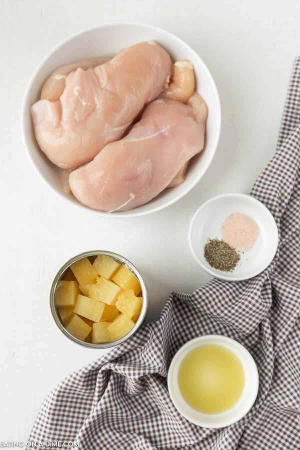 Baked Pineapple BBQ chicken recipe is the perfect meal idea and only requires 3 ingredients. It is so easy but tastes like you spent all day cooking. Ingredients needed for recipe: chicken breast, salt and pepper, BBQ sauce, pineapple chunks and olive oil.
