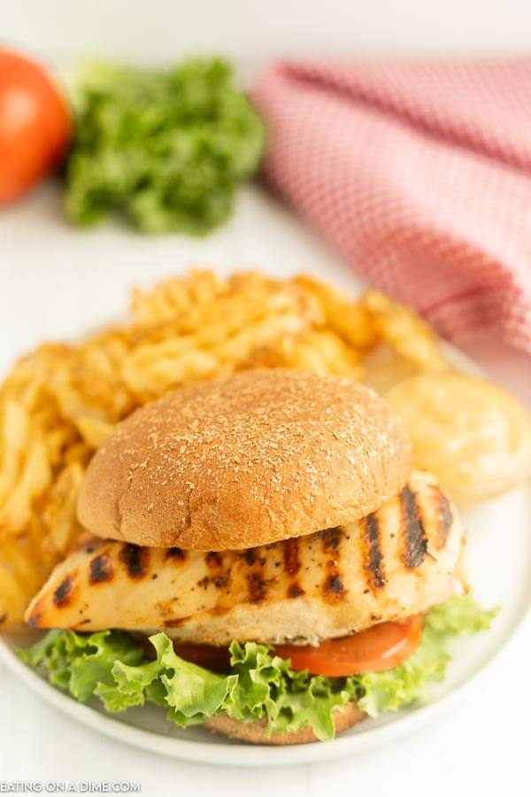 Chick-fil-a Grilled Chicken Sandwich on a plate with fries. 