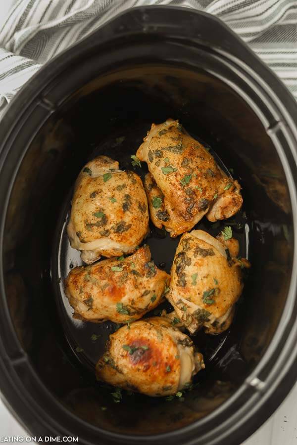 Close up image of Cilantro Lime Chicken Thighs in the slow cooker. 