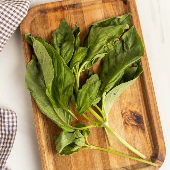 Fresh basil on a cutting board