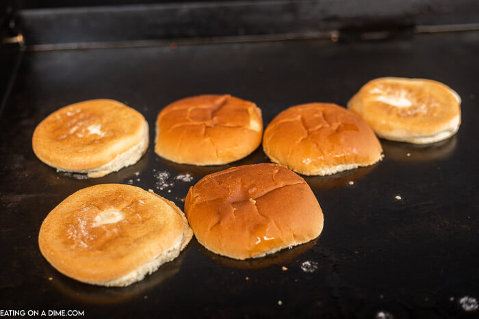 Buns placed on grill. 