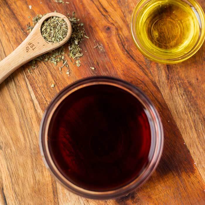 Close up image of a bowl of red wine vinegar