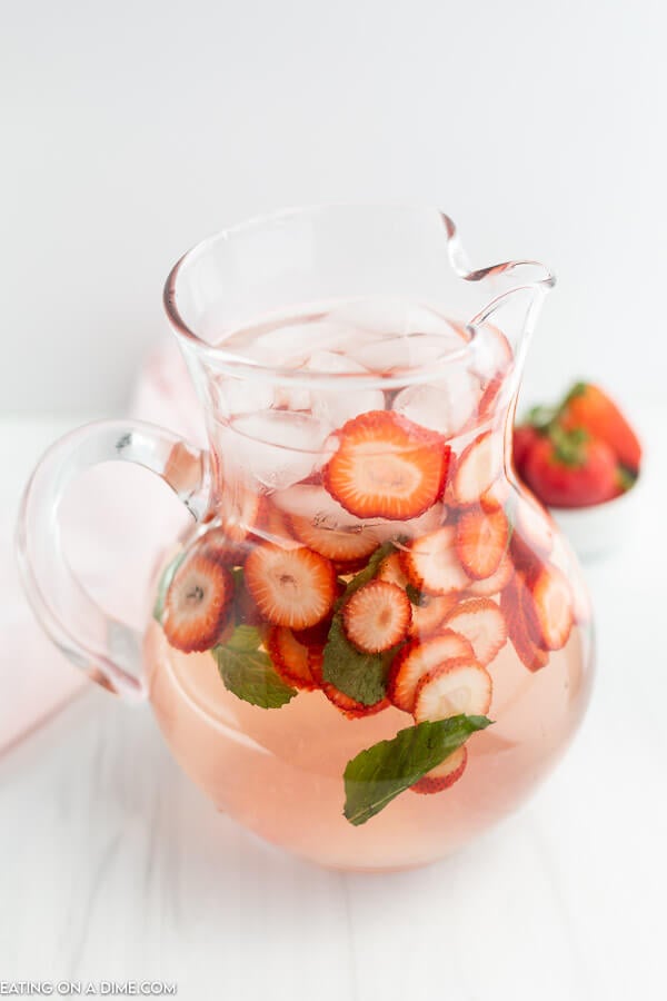 Pitcher of strawberry water. 
