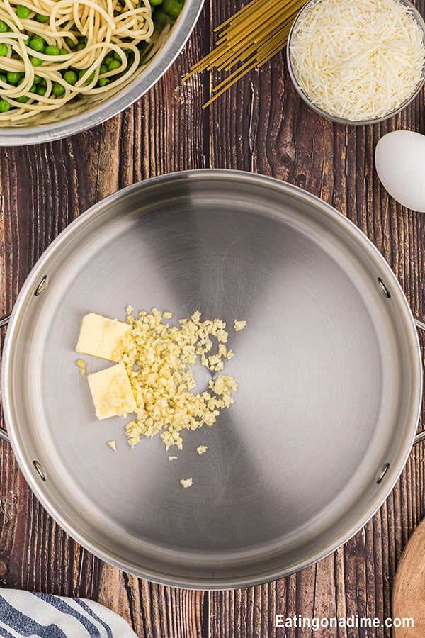 Cooking garlic and butter together in a skillet