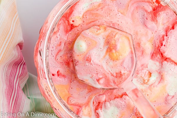 Rainbow sherbet punch in a punch bowl. 