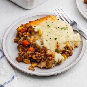 A serving of shepherd's pie on a plate.