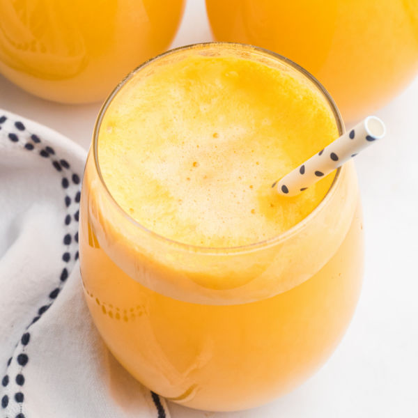 Orange Sherbet Punch Recipe in a glass. 