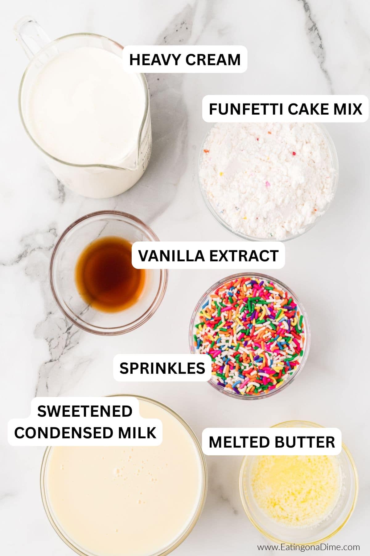 Ingredients needed for this recipe includes heavy whipping cream, sweetened condensed milk, vanilla extract, butter, funfetti cake mix, sprinkles.