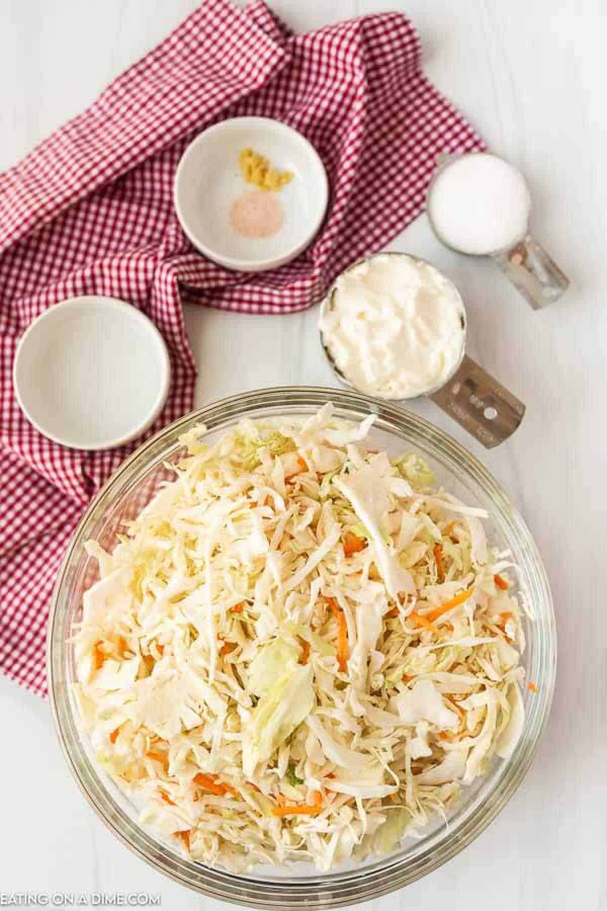 Ingredients for recipe: slaw, mayonnaise, vinegar, sugar, dry mustard and salt.