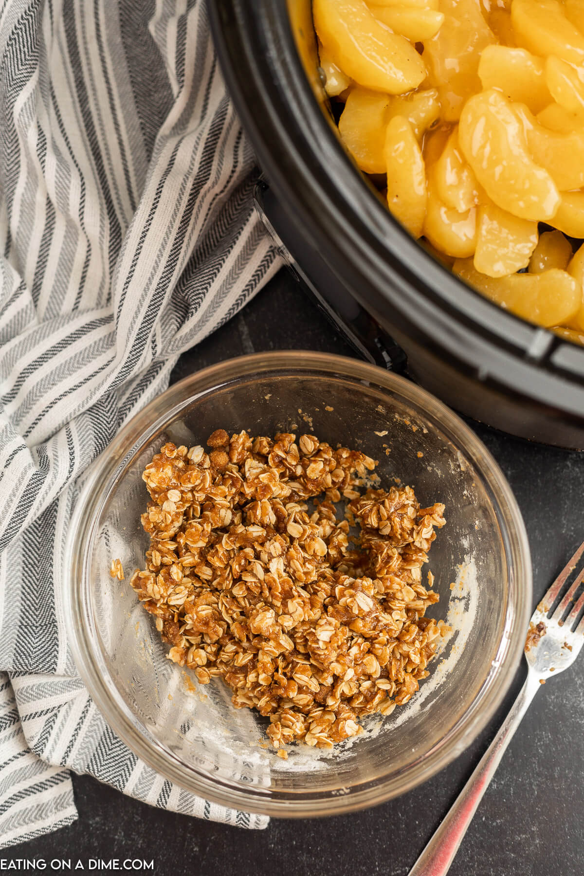 Making the crumble topping in a clear bowl