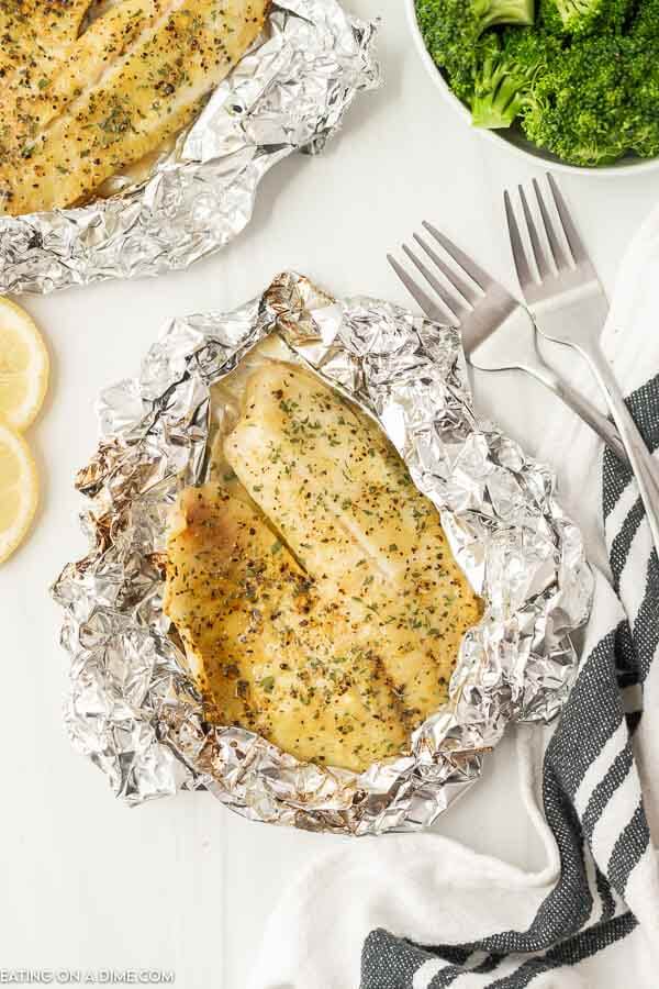 Close up image of grilled tilapia in a foil 