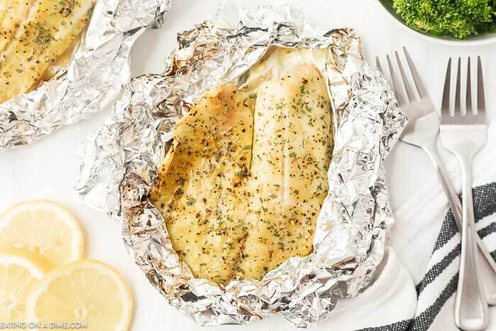 Close up image of grilled tilapia in a foil 