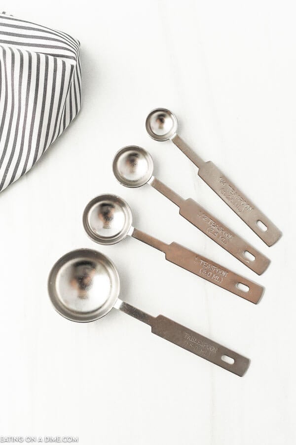 Close up image of teaspoons and tablespoons