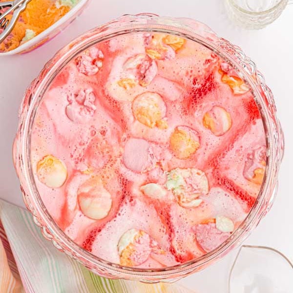 Rainbow sherbet punch in a punch bowl. 