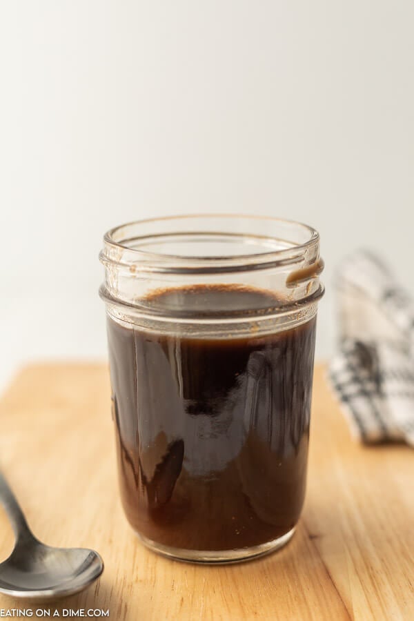 Worcestershire Sauce in a jar with a spoon