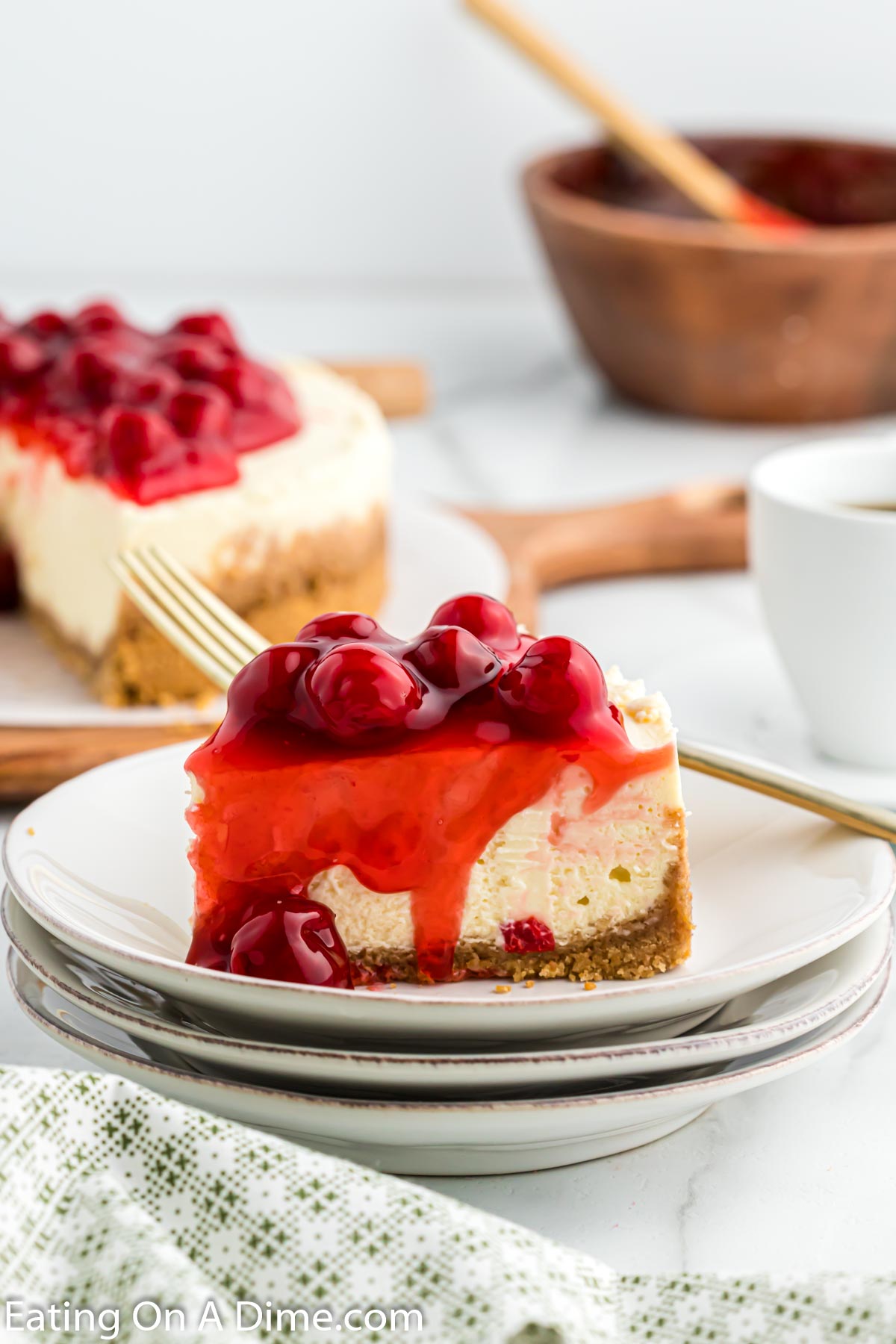 Instant Pot Cheesecake  topped with cherries. 
