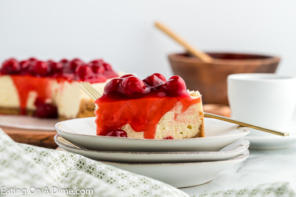 Instant Pot Cheesecake  topped with cherries. 