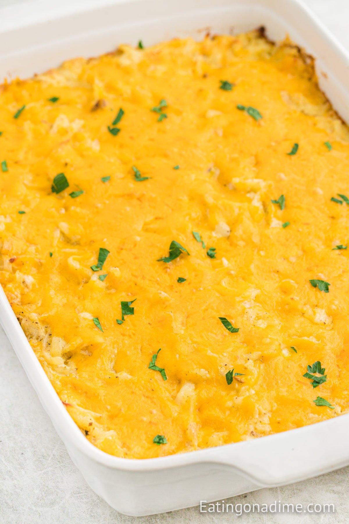 Cheesy Hashbrown casserole in a baking dish