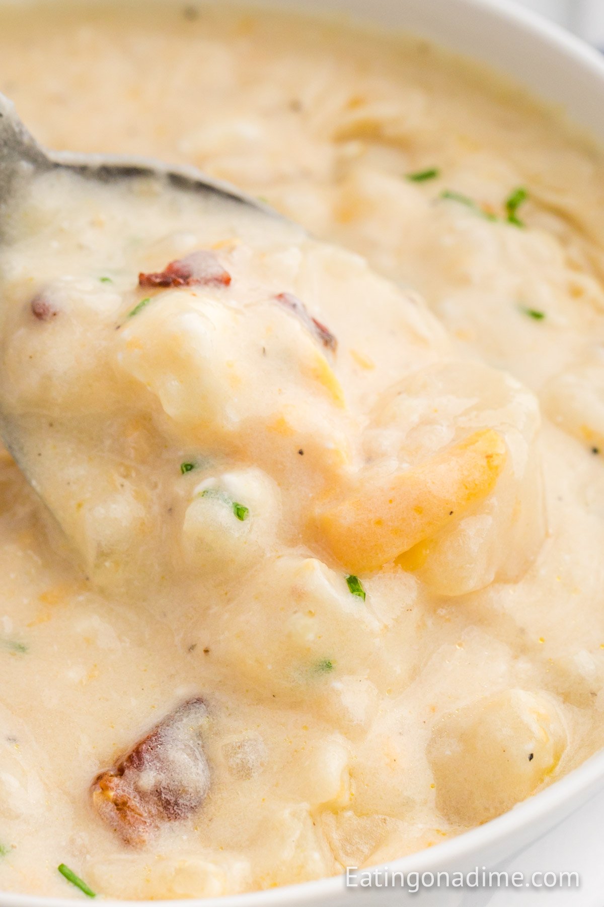 Close up of potato soup in a bowl. 