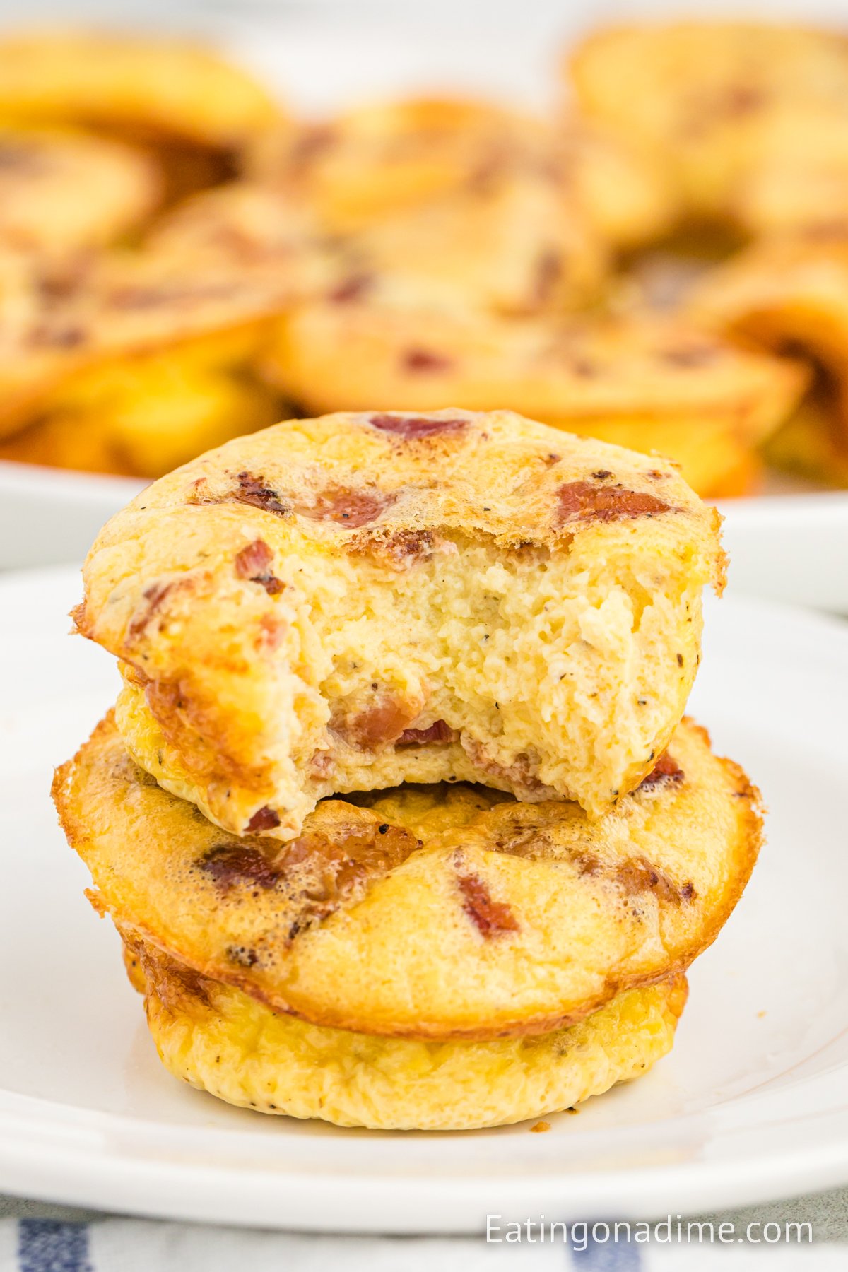 Egg Bites on a white plate stacked