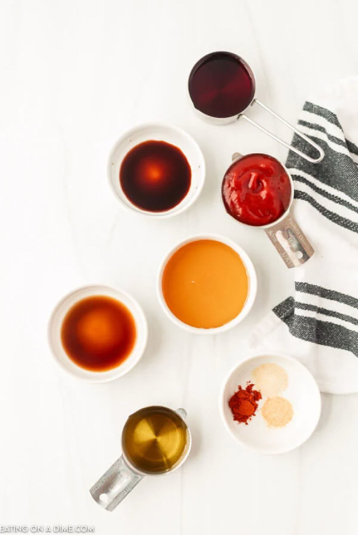 Ingredients for recipe: red wine vinegar, ketchup, honey, Worcestershire sauce, soy sauce, paprika, onion powder, garlic powder and olive oil.