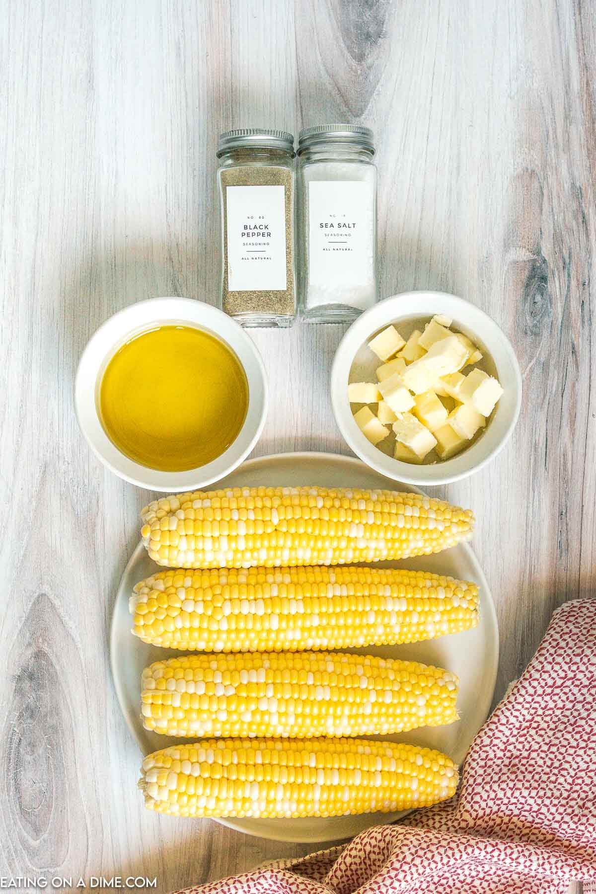 Ingredients needed - corn on the cob, olive oil, salt and pepper, butter