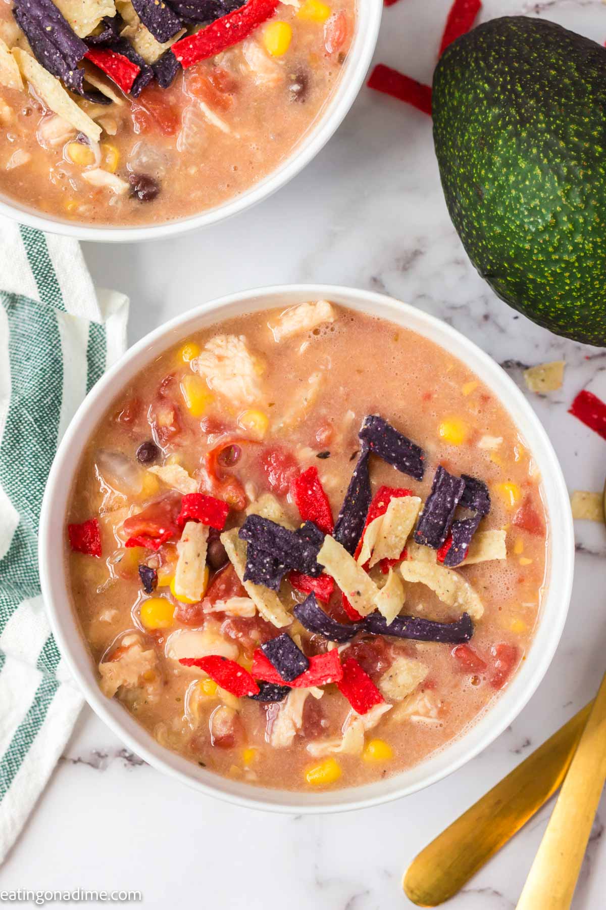 Close up image of chicken tortilla soup in a bowl