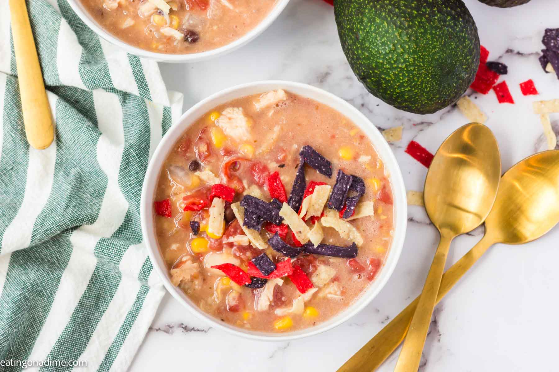 Close up image of chicken tortilla soup in a bowl