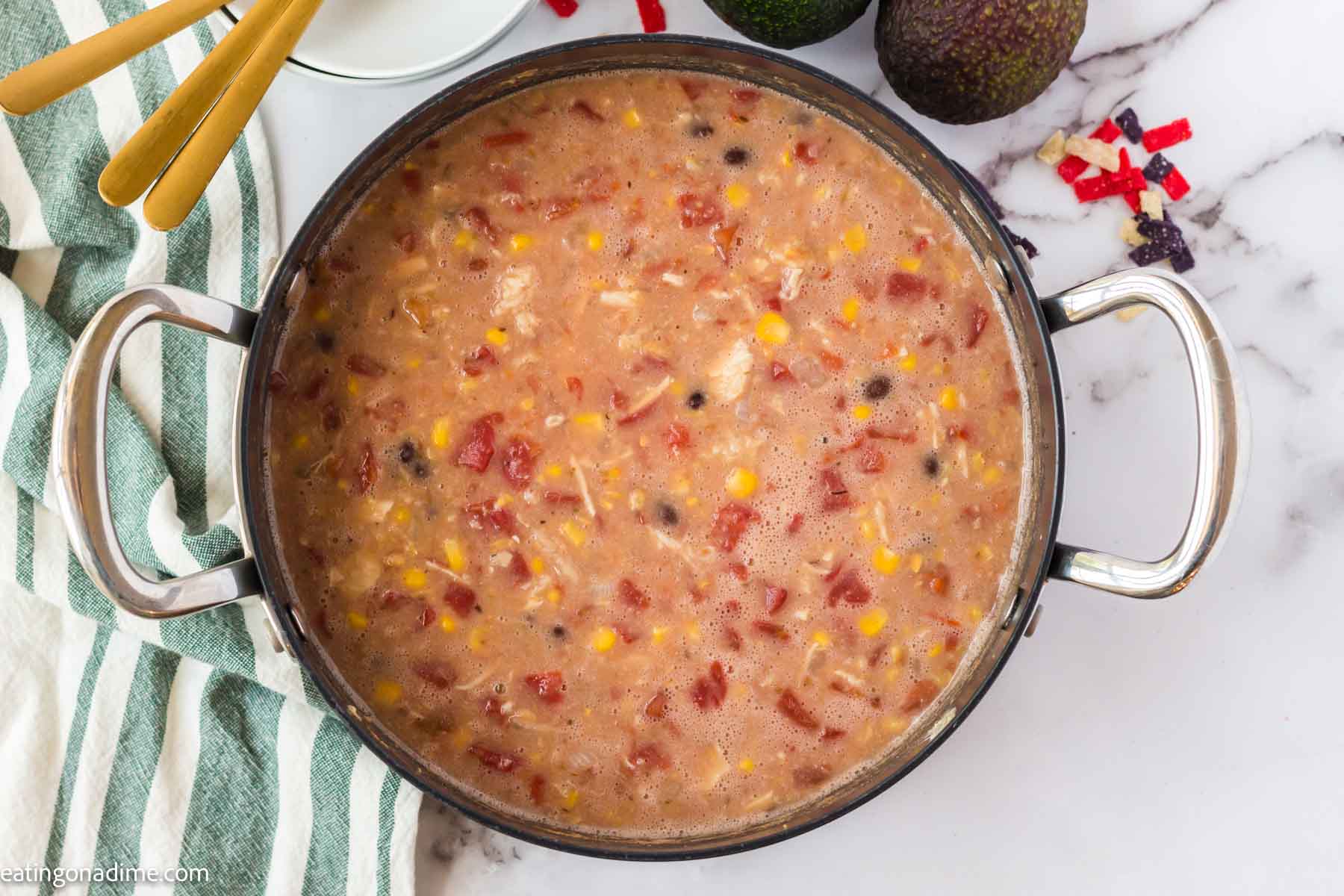 Chicken tortilla soup in a large pot