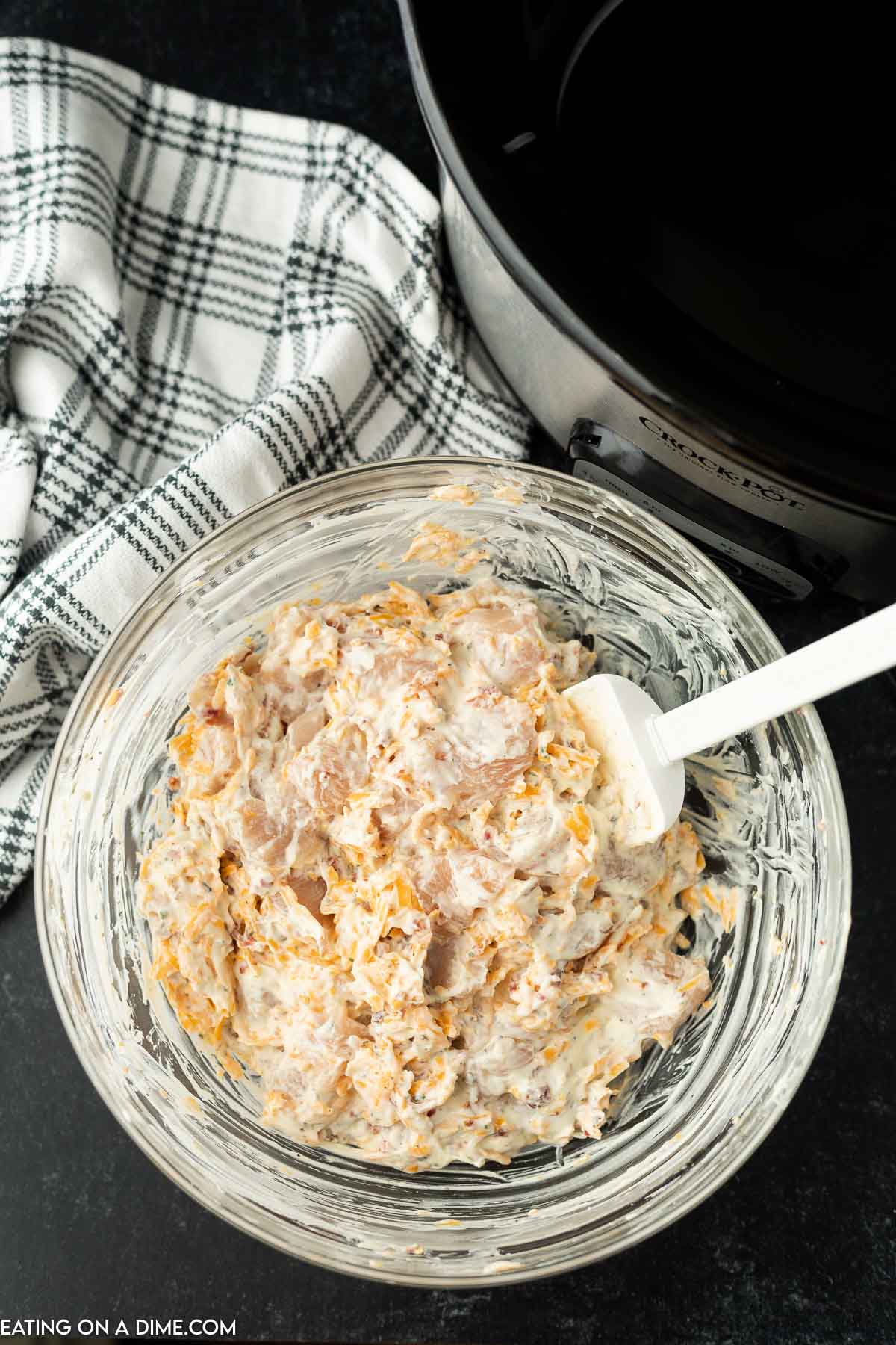 Crack chicken mixture in a clear bowl