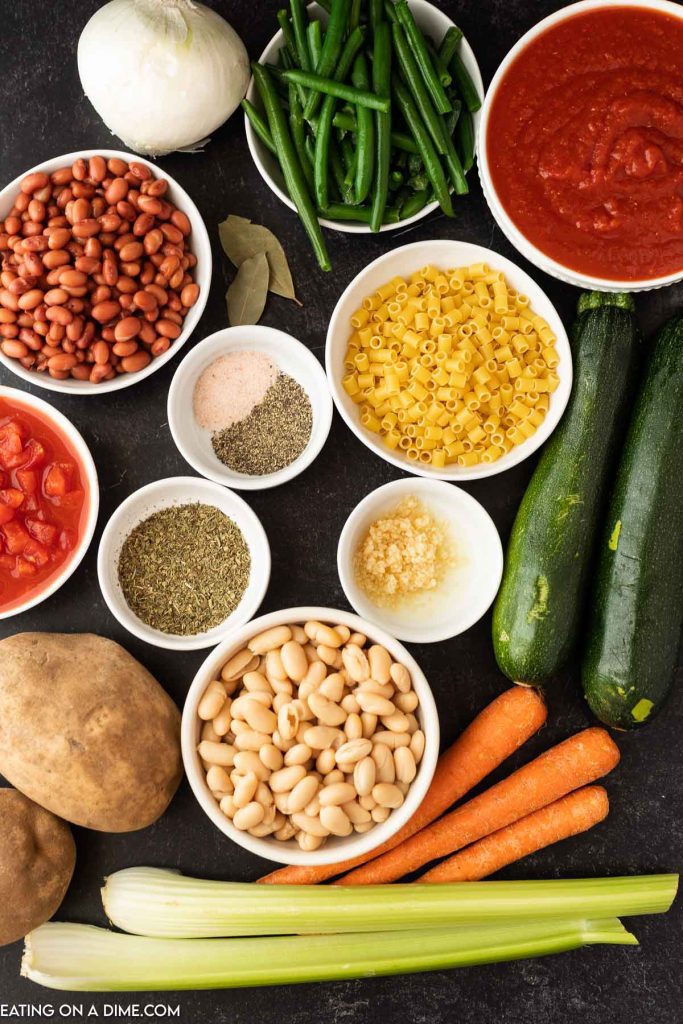 Ingredients needed - diced tomatoes, crushed tomatoes, carrots, potatoes, celery stalks, onion, garlic, italian seasoning, salt and pepper, bay leaves, broth, kidney beans, cannellini beans, green beans zucchini, pasta