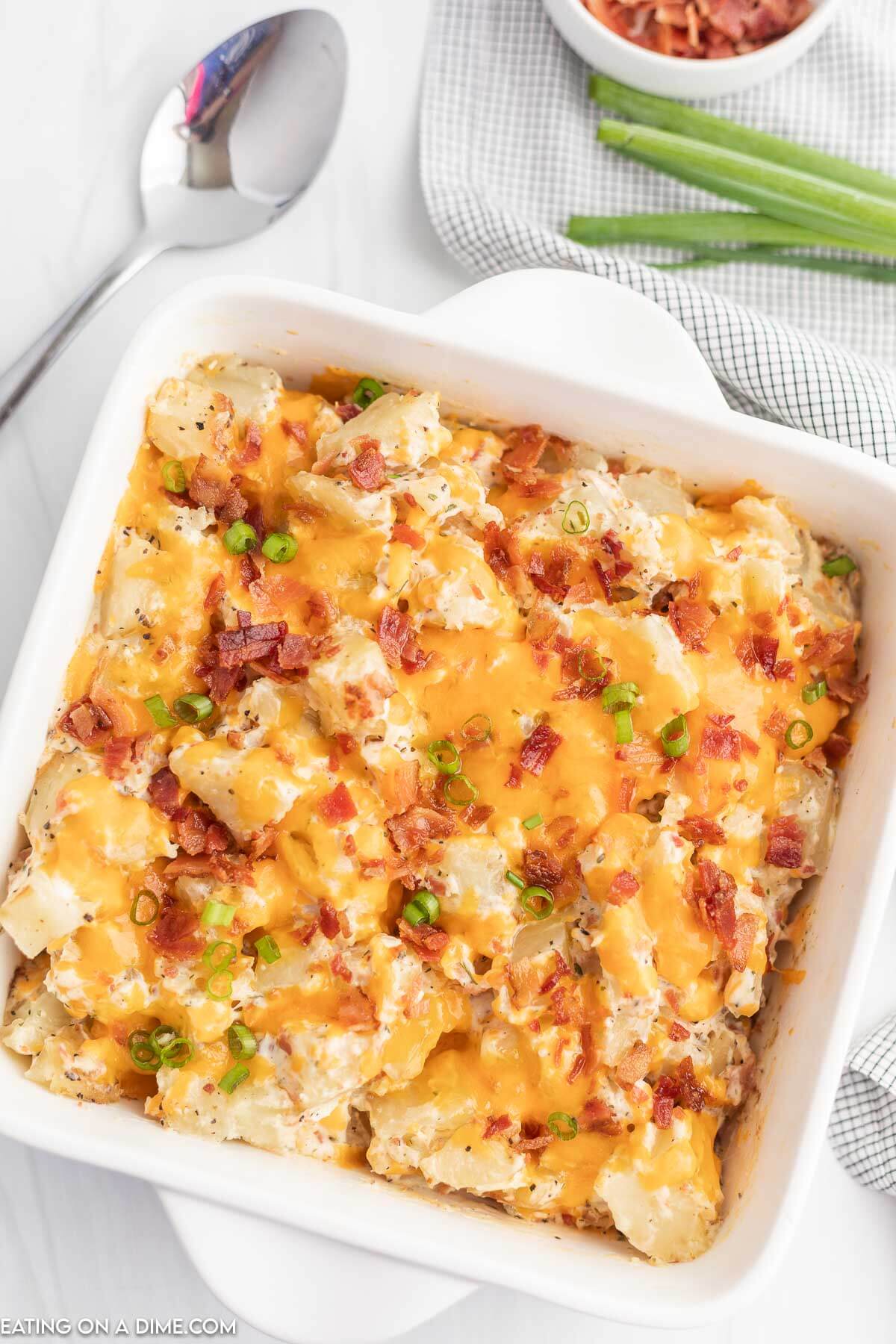 Crack potatoes in casserole dish.