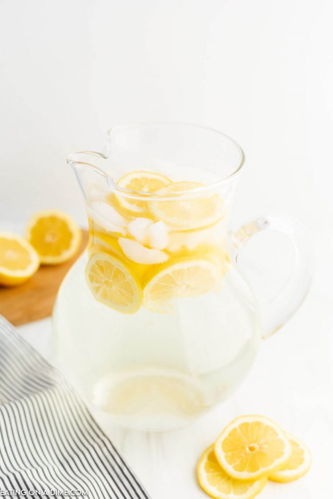 Lemon water in a pitcher. 