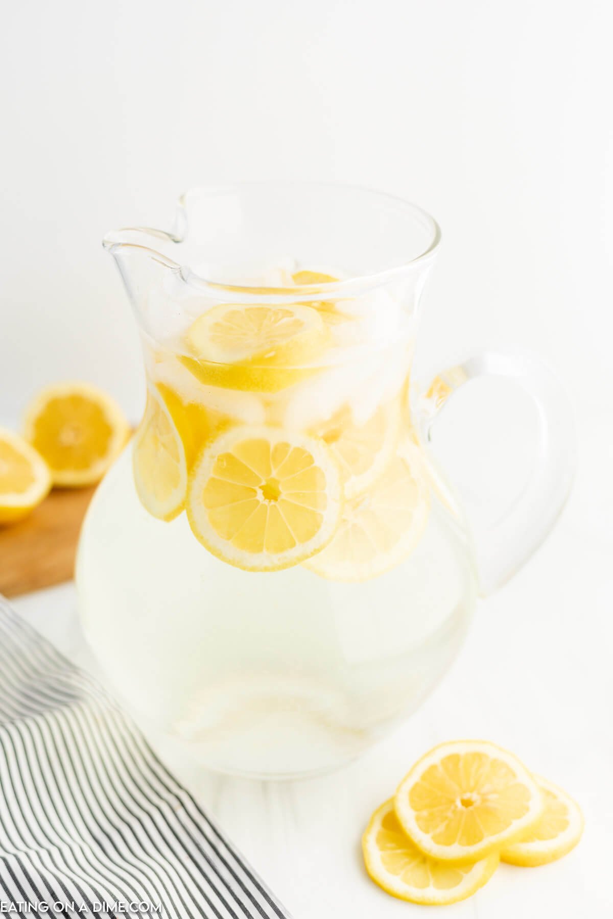 Lemon water in a pitcher. 