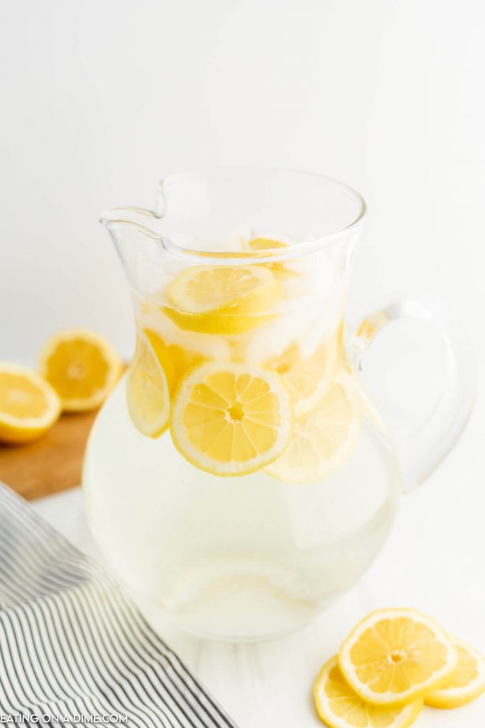 Lemon water in a pitcher. 