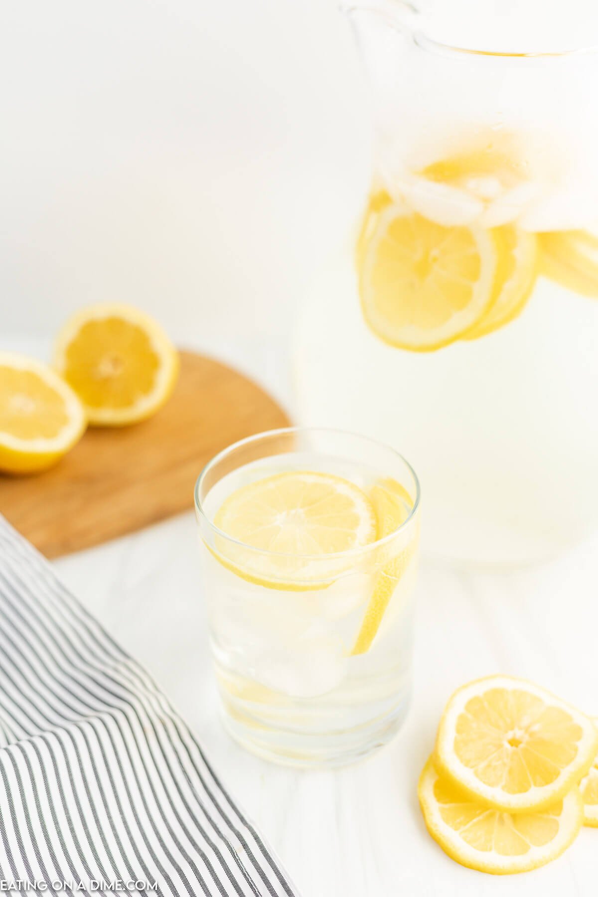 Lemon water in a pitcher. 