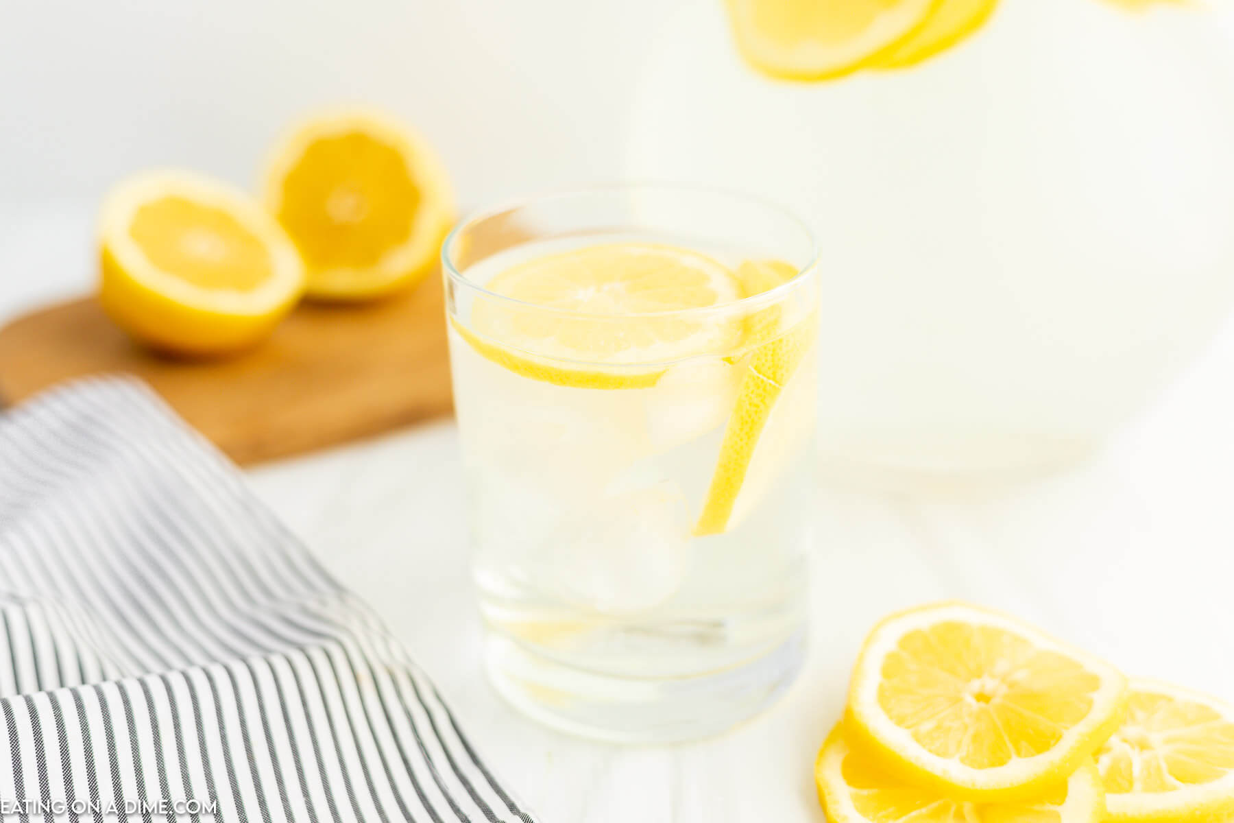 Lemon water in a pitcher. 