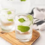 Water in glasses with mint leaves.