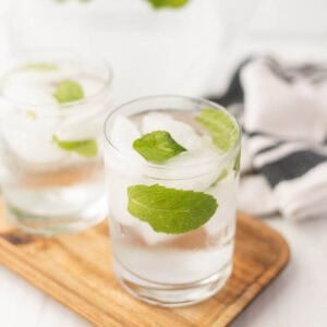 Water in glasses with mint leaves.