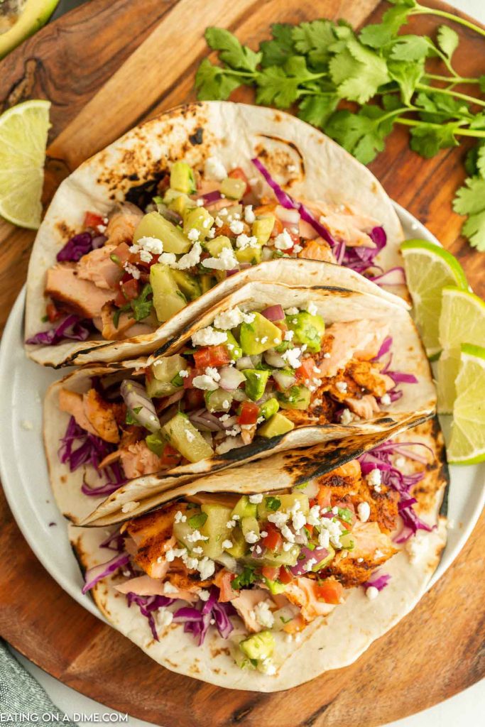 Grilled salmon tacos on a plate. 