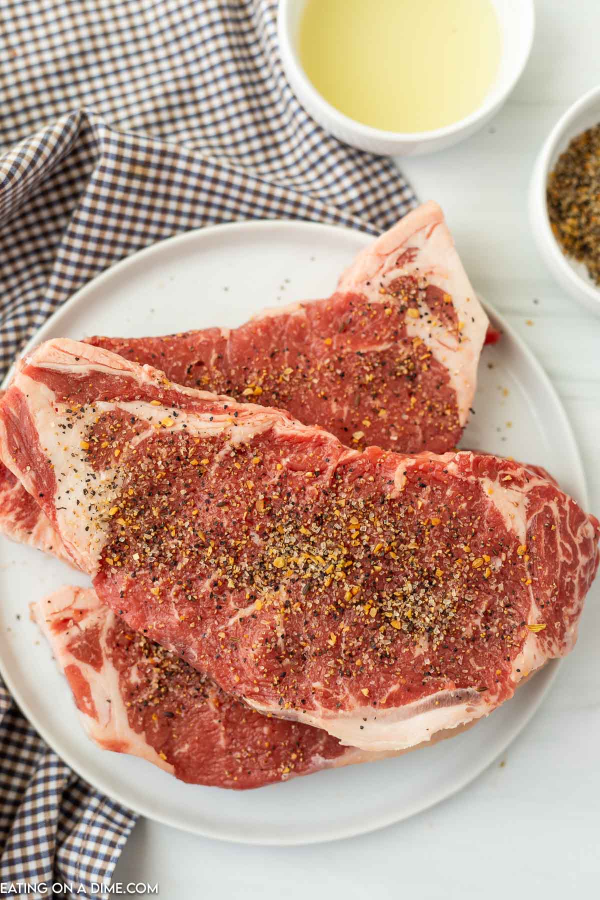 Steak with seasoning. 