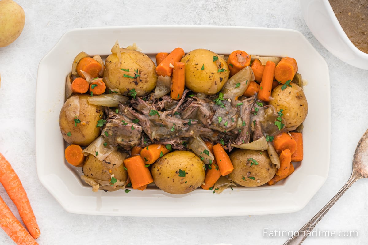 Chuck roast with potatoes and carrots on a platter